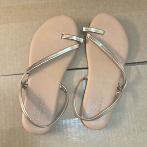 Tan and gold sandals